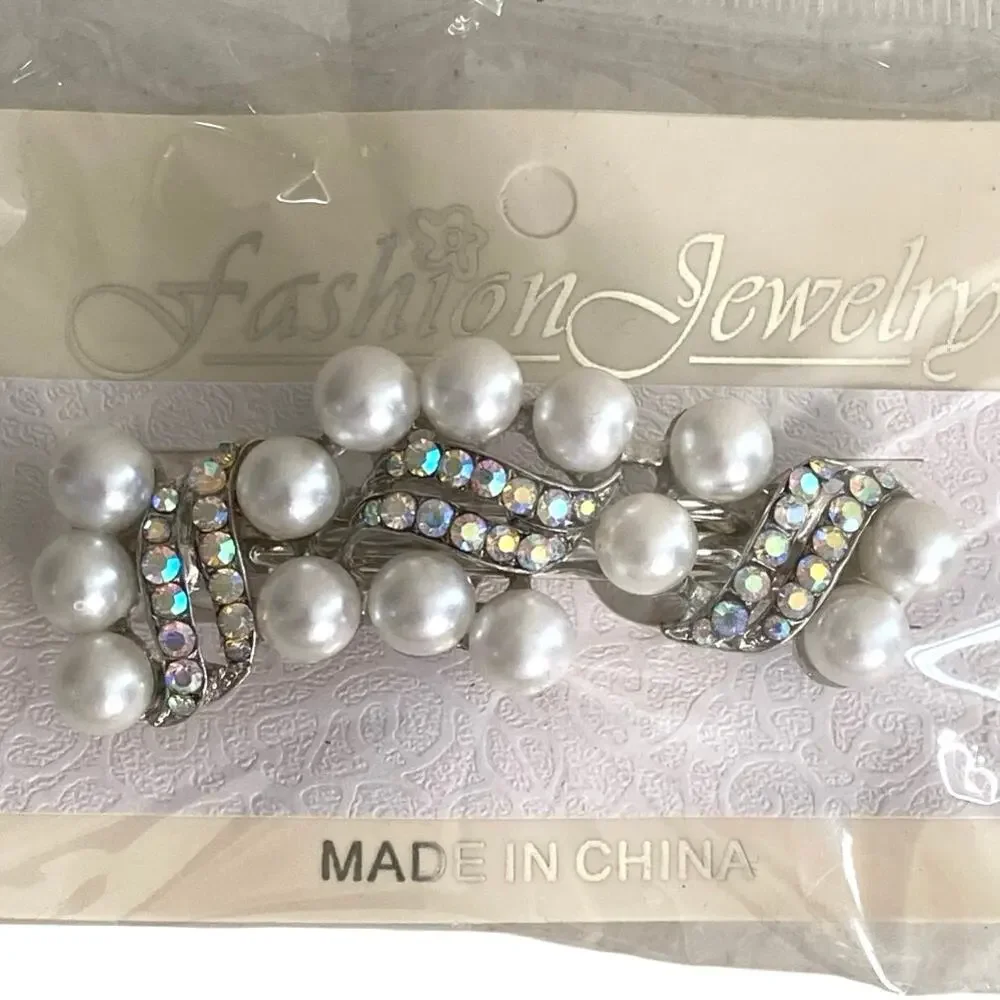 New in package Fashion Jewelry hair clip white pearls/rhinestones